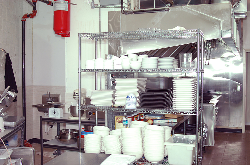 The compact restaurant commercial kitchen design leaves more space for dining.